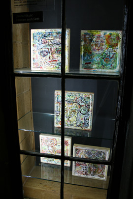 Small paintings in window